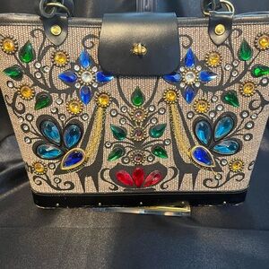 Vintage Enid Collins Purse is a unique accessory from the 1960s